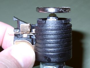 Magnet pressing LED against bolt